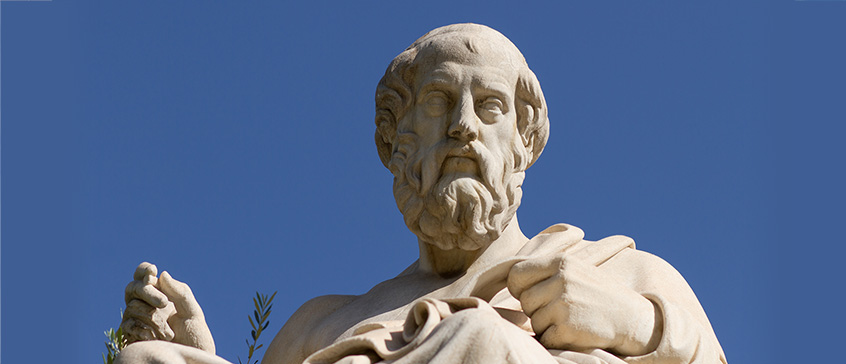 Photo of statue of philosopher. 