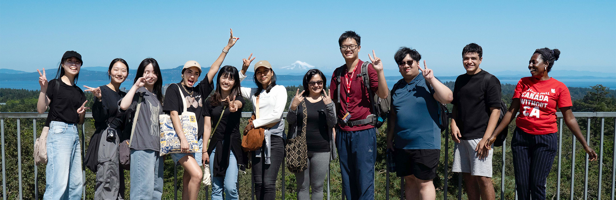 Students in front of Continuing Studies building at the end of their program. 
