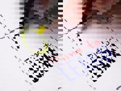 Photo of calendar with the words "Time to Learn" in the date square.