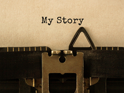 Text My Story typed on retro typewriter.