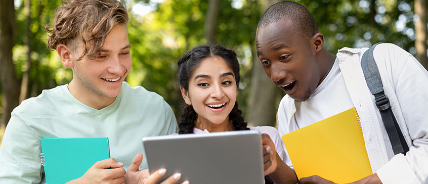 Students looking at a book