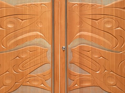 Doors carved with indigenous patterns