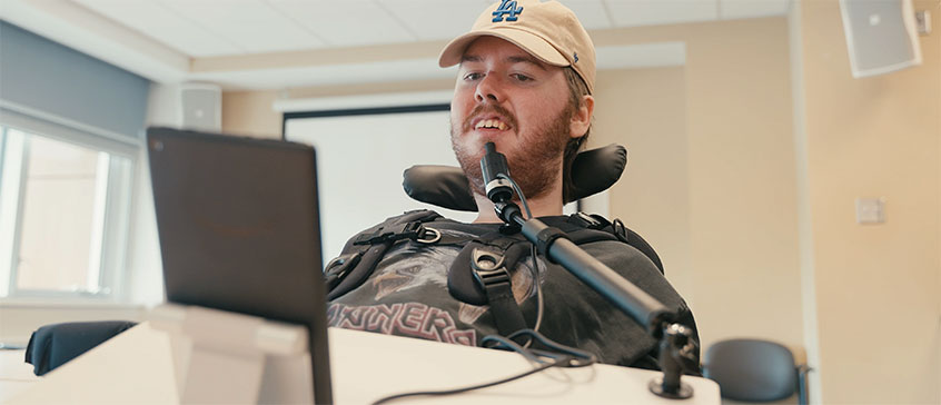 Collection of accessibility icons including wheelchair symbol, sign language hands, walking figure, ear for hearing, brain for cognitive accessibility, and eye for visual impairment, representing diverse workplace accommodations and inclusive design