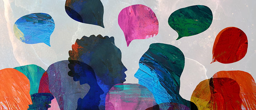 Colourful abstract silhouettes of people with vibrant speech bubbles above them, symbolizing cross-cultural communication and diverse perspectives in relationships.